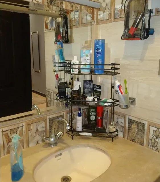 Three-tier black iron bathroom corner shelf