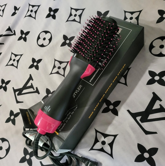 Black and pink hot air volumizer brush