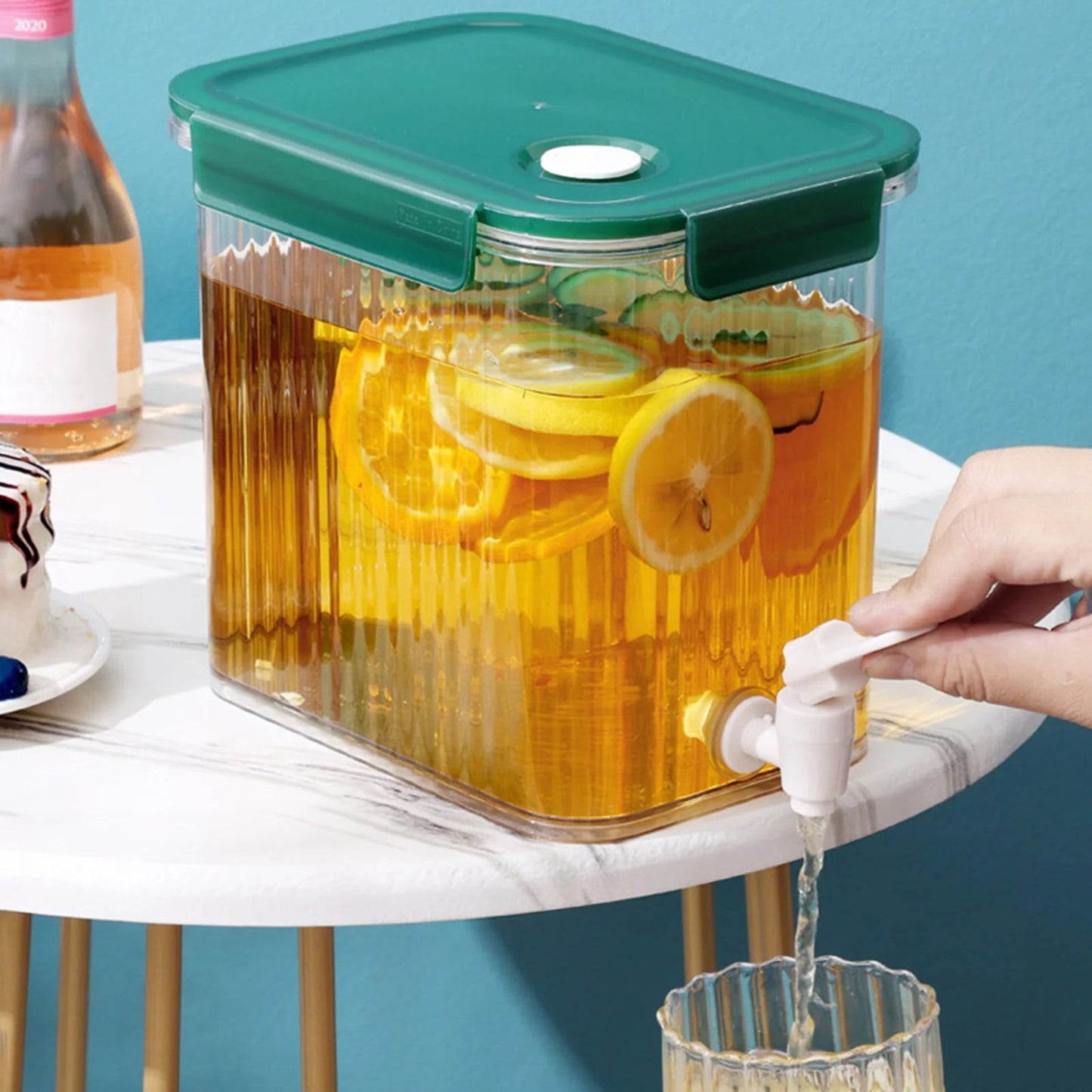 Refrigerator drink container with spigot